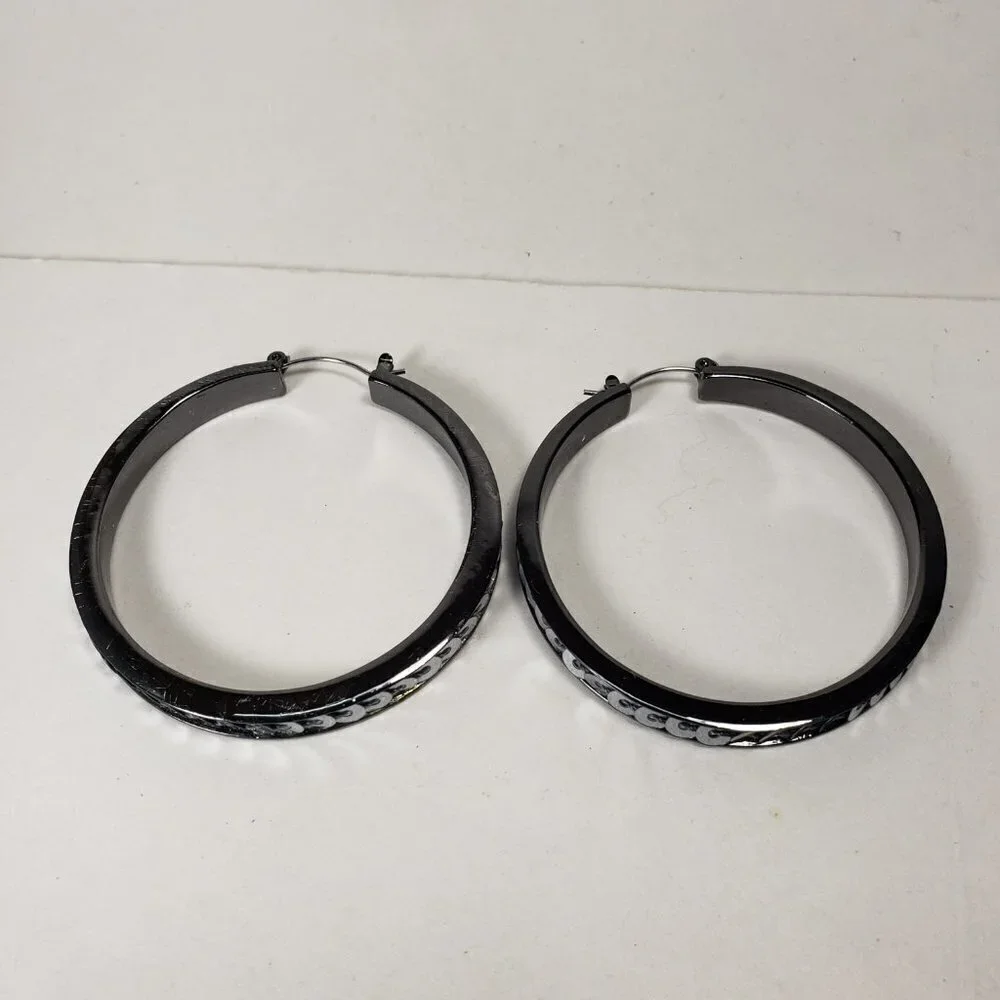 Women's Black Hoop Earrings with Polished Finish and Silver Tone Disc Accents